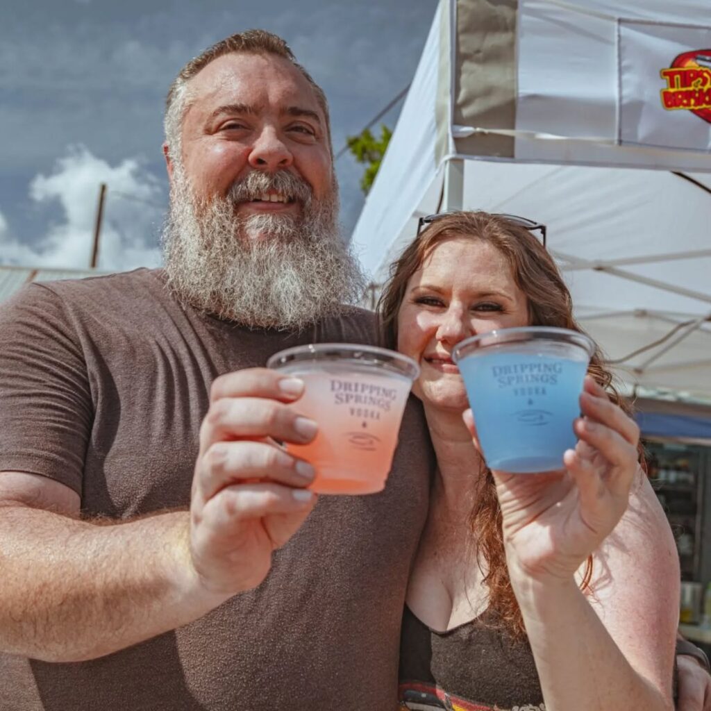 Noella Olds raising a Dripping Springs Vodka cup